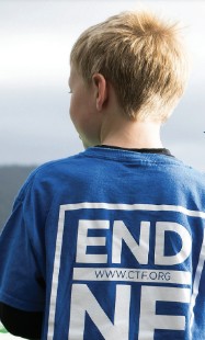 Boy wearing "end NF" shirt