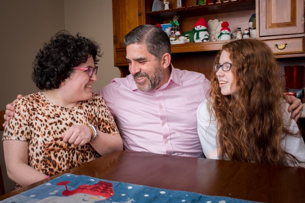 family sitting around table