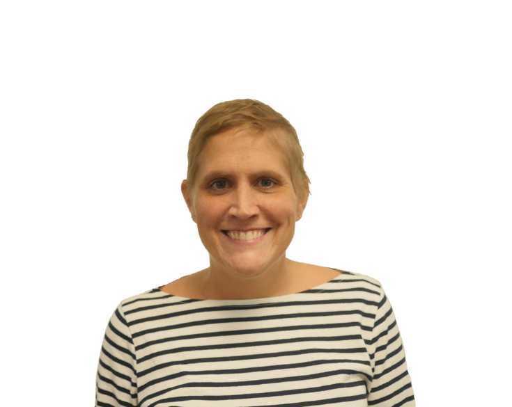 A woman in a striped shirt smiling.