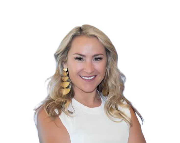 A smiling woman in a white top with gold earrings.