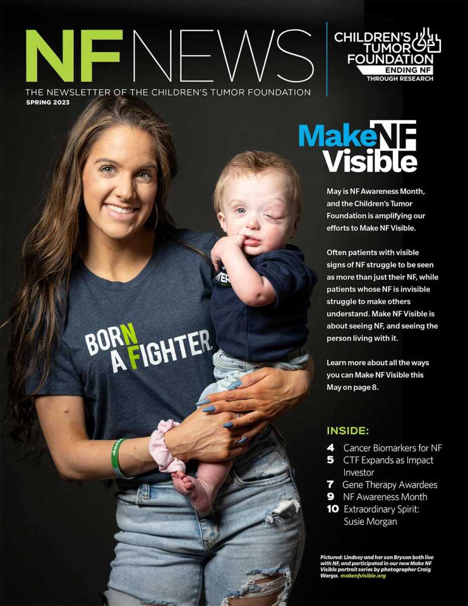 A woman holding a baby on the cover of nf news.