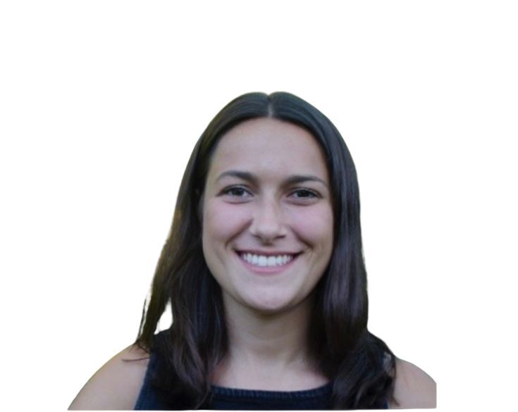 A portrait of a smiling woman with long dark hair, wearing a black top, against a plain white background.