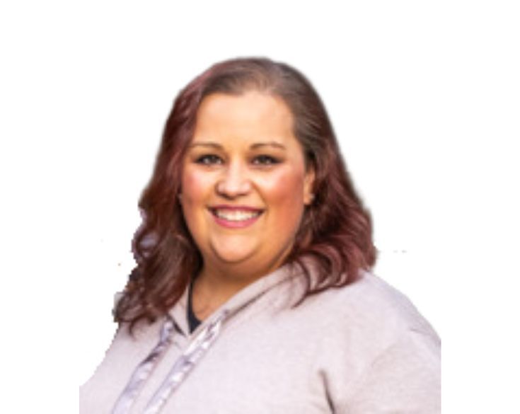 Portrait of a smiling woman with shoulder-length brown hair, wearing a gray jacket over a light blouse, isolated on a white background.